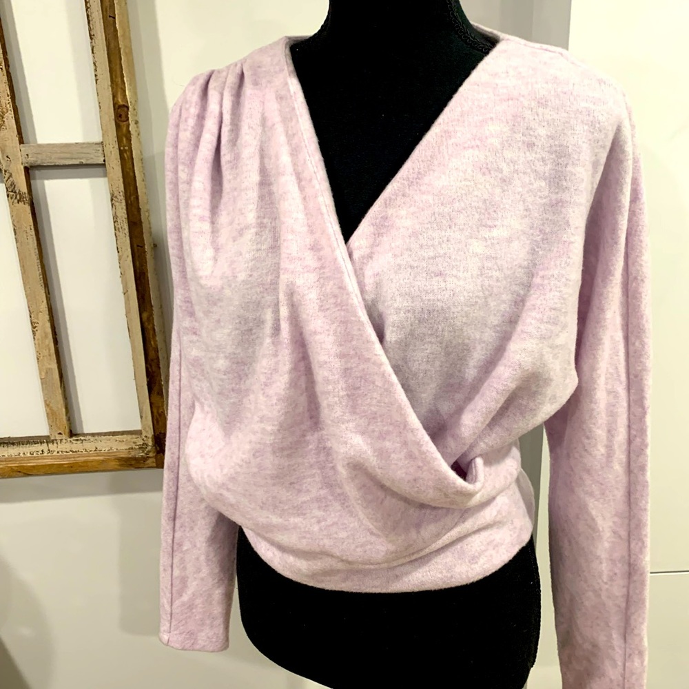 A soft lilac sweater. Perfect for cold winter weather.